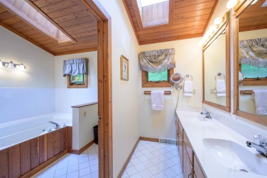 Tucked into the wooded hillside at the end of long ascending on Eagle Ridge Inn and Resort in Illinois - for sale on GolfHomes.com, golf home, golf lot