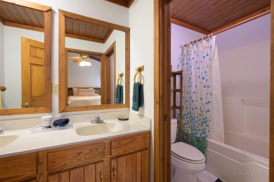 Tucked into the wooded hillside at the end of long ascending on Eagle Ridge Inn and Resort in Illinois - for sale on GolfHomes.com, golf home, golf lot