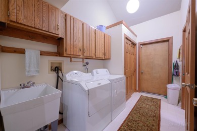 Tucked into the wooded hillside at the end of long ascending on Eagle Ridge Inn and Resort in Illinois - for sale on GolfHomes.com, golf home, golf lot