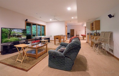 Tucked into the wooded hillside at the end of long ascending on Eagle Ridge Inn and Resort in Illinois - for sale on GolfHomes.com, golf home, golf lot