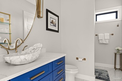 Experience modern coastal elegance in this architecturally on Tiger Point Golf and Country Club in Florida - for sale on GolfHomes.com, golf home, golf lot