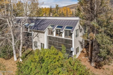 Excellent location and natural light in this end-unit, 3 on  in Colorado - for sale on GolfHomes.com, golf home, golf lot