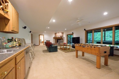 Tucked into the wooded hillside at the end of long ascending on Eagle Ridge Inn and Resort in Illinois - for sale on GolfHomes.com, golf home, golf lot
