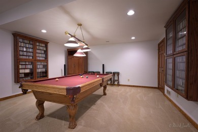 Tucked into the wooded hillside at the end of long ascending on Eagle Ridge Inn and Resort in Illinois - for sale on GolfHomes.com, golf home, golf lot