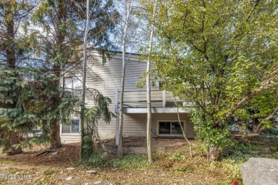 Excellent location and natural light in this end-unit, 3 on  in Colorado - for sale on GolfHomes.com, golf home, golf lot