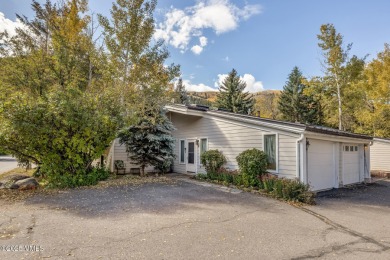 Excellent location and natural light in this end-unit, 3 on  in Colorado - for sale on GolfHomes.com, golf home, golf lot