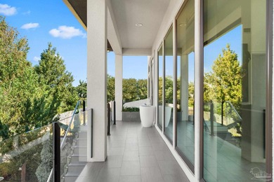 Experience modern coastal elegance in this architecturally on Tiger Point Golf and Country Club in Florida - for sale on GolfHomes.com, golf home, golf lot