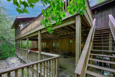 Tucked into the wooded hillside at the end of long ascending on Eagle Ridge Inn and Resort in Illinois - for sale on GolfHomes.com, golf home, golf lot