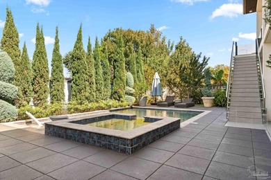 Experience modern coastal elegance in this architecturally on Tiger Point Golf and Country Club in Florida - for sale on GolfHomes.com, golf home, golf lot