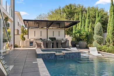 Experience modern coastal elegance in this architecturally on Tiger Point Golf and Country Club in Florida - for sale on GolfHomes.com, golf home, golf lot