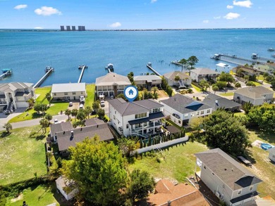 Experience modern coastal elegance in this architecturally on Tiger Point Golf and Country Club in Florida - for sale on GolfHomes.com, golf home, golf lot