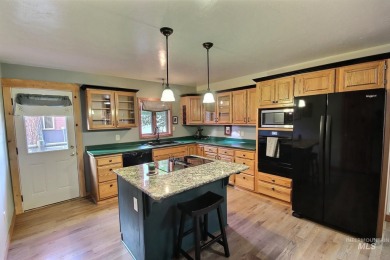 Escape to your dream cabin in beautiful McCall! This charming on McCall Municipal Golf Course in Idaho - for sale on GolfHomes.com, golf home, golf lot