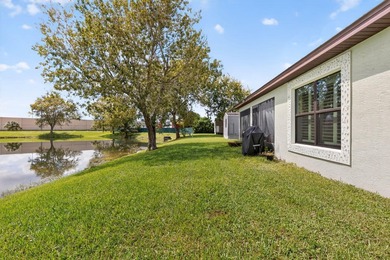 Enjoy gorgeous lake views from this gently lived-in home in a on Spanish Lakes Fairways in Florida - for sale on GolfHomes.com, golf home, golf lot