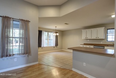 Discover this fantastic home nestled in the north end of Hickory on Mississippi National Golf Course in Mississippi - for sale on GolfHomes.com, golf home, golf lot