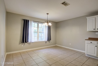 Discover this fantastic home nestled in the north end of Hickory on Mississippi National Golf Course in Mississippi - for sale on GolfHomes.com, golf home, golf lot