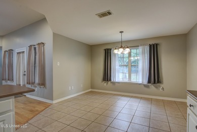 Discover this fantastic home nestled in the north end of Hickory on Mississippi National Golf Course in Mississippi - for sale on GolfHomes.com, golf home, golf lot