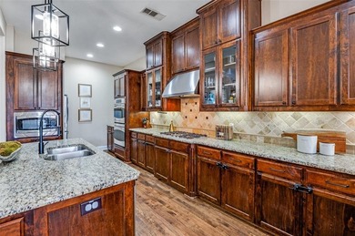 Welcome to 8025 Strathmill, a gorgeous Tudor-style home on The Tribute At the Colony in Texas - for sale on GolfHomes.com, golf home, golf lot