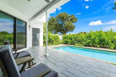 Stunning and renovated 3 BD 2.2 BA home, with a pool and golf on Broken Sound Golf and Club  in Florida - for sale on GolfHomes.com, golf home, golf lot