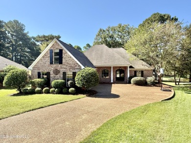 This inviting home sits on the Whisper Lake Golf Course in the on Annandale Golf Club in Mississippi - for sale on GolfHomes.com, golf home, golf lot
