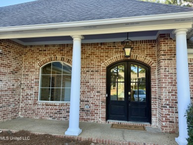 This inviting home sits on the Whisper Lake Golf Course in the on Annandale Golf Club in Mississippi - for sale on GolfHomes.com, golf home, golf lot
