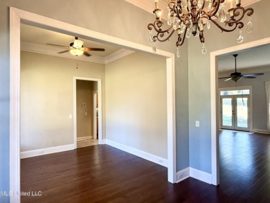 This inviting home sits on the Whisper Lake Golf Course in the on Annandale Golf Club in Mississippi - for sale on GolfHomes.com, golf home, golf lot