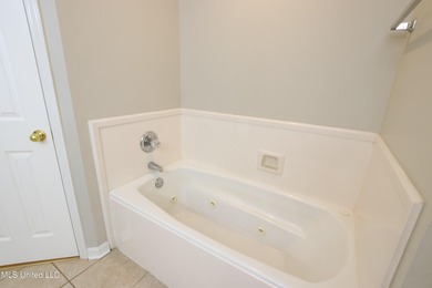 Discover this fantastic home nestled in the north end of Hickory on Mississippi National Golf Course in Mississippi - for sale on GolfHomes.com, golf home, golf lot