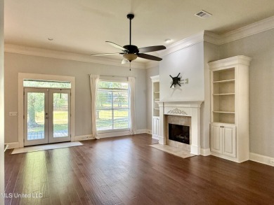 This inviting home sits on the Whisper Lake Golf Course in the on Annandale Golf Club in Mississippi - for sale on GolfHomes.com, golf home, golf lot