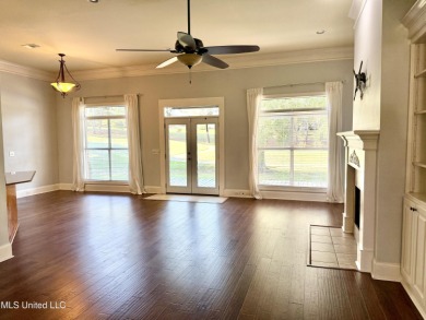 This inviting home sits on the Whisper Lake Golf Course in the on Annandale Golf Club in Mississippi - for sale on GolfHomes.com, golf home, golf lot