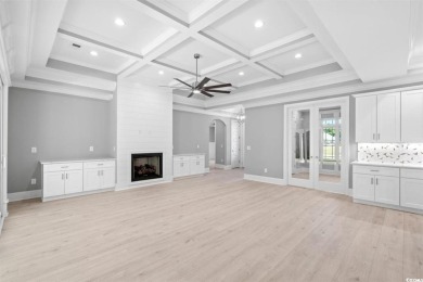 This brand-new custom home boasts 5 spacious bedrooms and 4 on Wild Wing Plantation in South Carolina - for sale on GolfHomes.com, golf home, golf lot