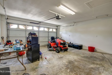 Discover this fantastic home nestled in the north end of Hickory on Mississippi National Golf Course in Mississippi - for sale on GolfHomes.com, golf home, golf lot