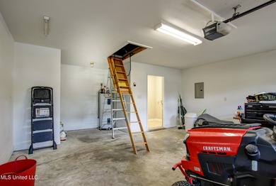 Discover this fantastic home nestled in the north end of Hickory on Mississippi National Golf Course in Mississippi - for sale on GolfHomes.com, golf home, golf lot