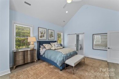 This recently built modern farmhouse (2024) still looks brand on Granada Farms Country Club in North Carolina - for sale on GolfHomes.com, golf home, golf lot