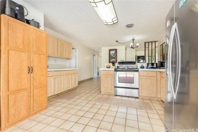 This beautifully maintained 4-bedroom, 2-bath home is located in on Mililani Golf Club in Hawaii - for sale on GolfHomes.com, golf home, golf lot