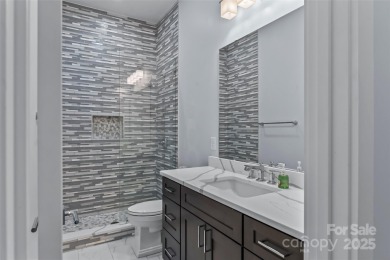 This recently built modern farmhouse (2024) still looks brand on Granada Farms Country Club in North Carolina - for sale on GolfHomes.com, golf home, golf lot