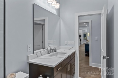 This recently built modern farmhouse (2024) still looks brand on Granada Farms Country Club in North Carolina - for sale on GolfHomes.com, golf home, golf lot