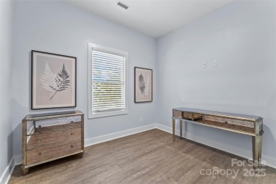 This recently built modern farmhouse (2024) still looks brand on Granada Farms Country Club in North Carolina - for sale on GolfHomes.com, golf home, golf lot