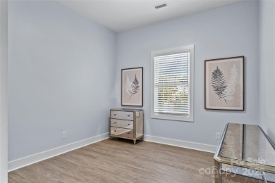 This recently built modern farmhouse (2024) still looks brand on Granada Farms Country Club in North Carolina - for sale on GolfHomes.com, golf home, golf lot