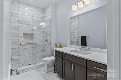 This recently built modern farmhouse (2024) still looks brand on Granada Farms Country Club in North Carolina - for sale on GolfHomes.com, golf home, golf lot