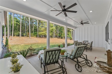 This recently built modern farmhouse (2024) still looks brand on Granada Farms Country Club in North Carolina - for sale on GolfHomes.com, golf home, golf lot