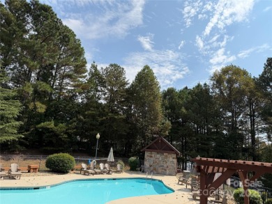 This recently built modern farmhouse (2024) still looks brand on Granada Farms Country Club in North Carolina - for sale on GolfHomes.com, golf home, golf lot