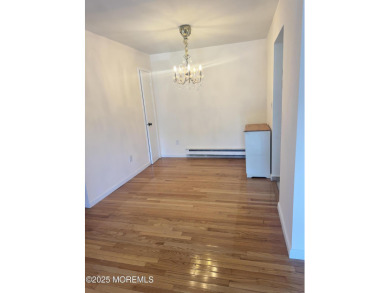 Beautiful, light-filled upper-floor 2-bedroom, 2 full bath unit on Pine Brook Golf Course in New Jersey - for sale on GolfHomes.com, golf home, golf lot