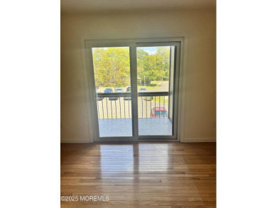 Beautiful, light-filled upper-floor 2-bedroom, 2 full bath unit on Pine Brook Golf Course in New Jersey - for sale on GolfHomes.com, golf home, golf lot