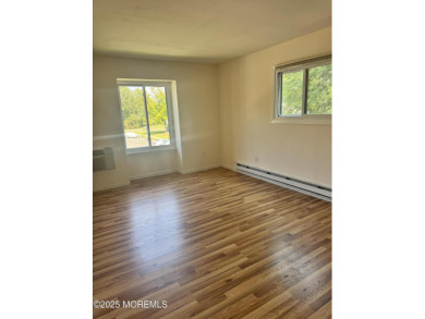 Beautiful, light-filled upper-floor 2-bedroom, 2 full bath unit on Pine Brook Golf Course in New Jersey - for sale on GolfHomes.com, golf home, golf lot