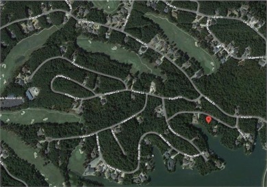 Serene water front .45 acre lot on Lake Granada, with 156-foot on Granada Golf Course in Arkansas - for sale on GolfHomes.com, golf home, golf lot