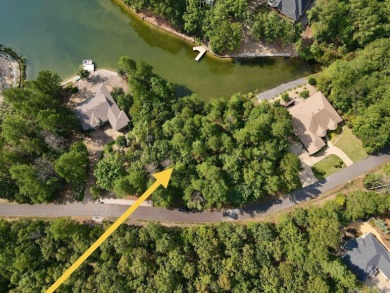 Serene water front .45 acre lot on Lake Granada, with 156-foot on Granada Golf Course in Arkansas - for sale on GolfHomes.com, golf home, golf lot
