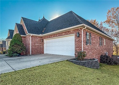 This beautifully maintained 4-bedroom, 3-bath home is located in on Harrison Country Club in Arkansas - for sale on GolfHomes.com, golf home, golf lot