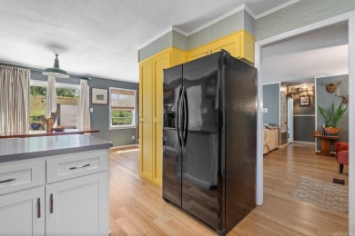 Enjoy resort-style living on the 11th green of Diamondhead Golf on Diamondhead Golf and Country Club in Arkansas - for sale on GolfHomes.com, golf home, golf lot