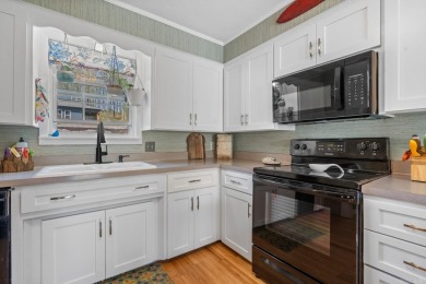 Enjoy resort-style living on the 11th green of Diamondhead Golf on Diamondhead Golf and Country Club in Arkansas - for sale on GolfHomes.com, golf home, golf lot