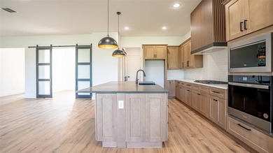 New build by Aubree Homes in sought after Thomas Crossing home on Southern Oaks Golf Club in Texas - for sale on GolfHomes.com, golf home, golf lot