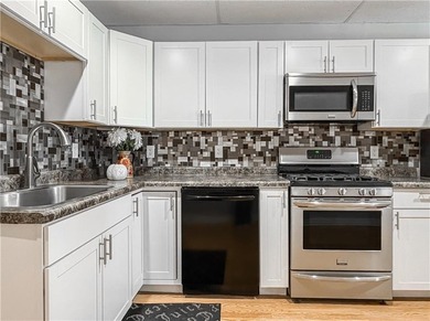 This beautifully maintained 4-bedroom, 3-bath home is located in on Harrison Country Club in Arkansas - for sale on GolfHomes.com, golf home, golf lot